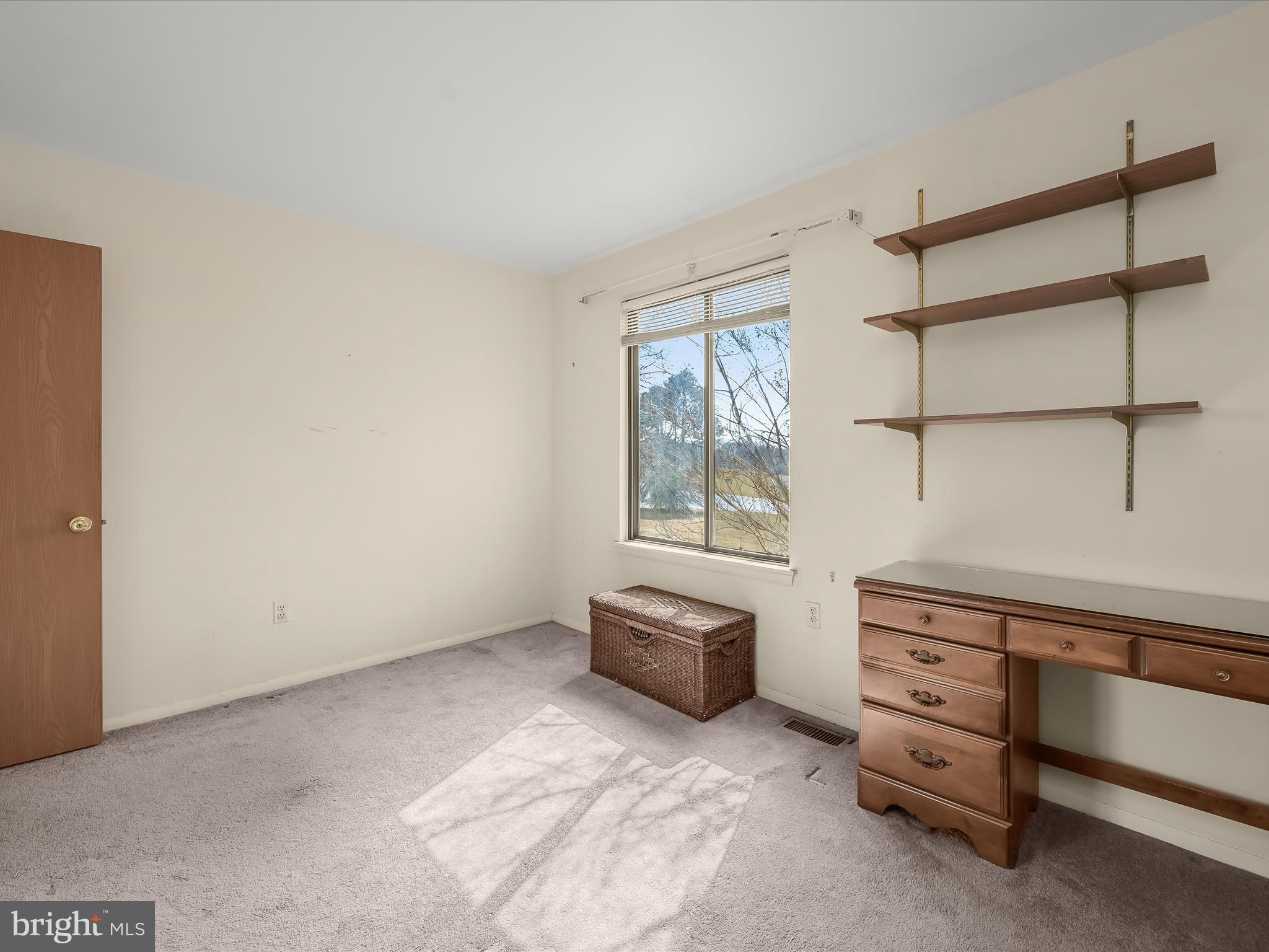 1100 Cedarbrook Road Hampstead, MD 21074 - Photo 22 of 46 a room with furniture and window