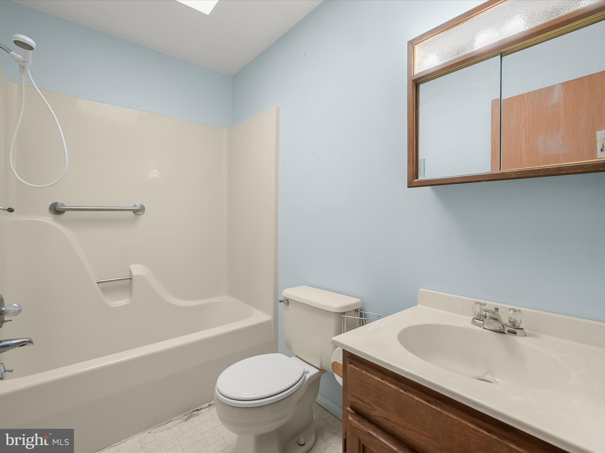 1100 Cedarbrook Road Hampstead, MD 21074 - Photo 27 of 46 a bathroom with a sink toilet and a bathtub