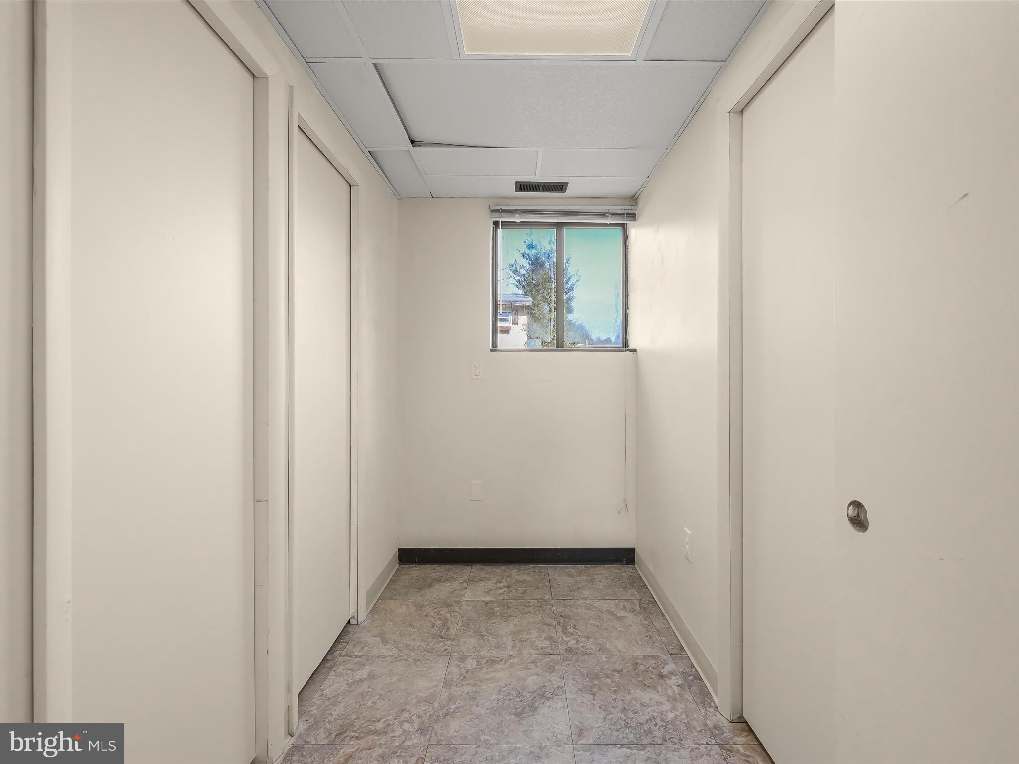 1100 Cedarbrook Road Hampstead, MD 21074 - Photo 33 of 46 an empty room with windows