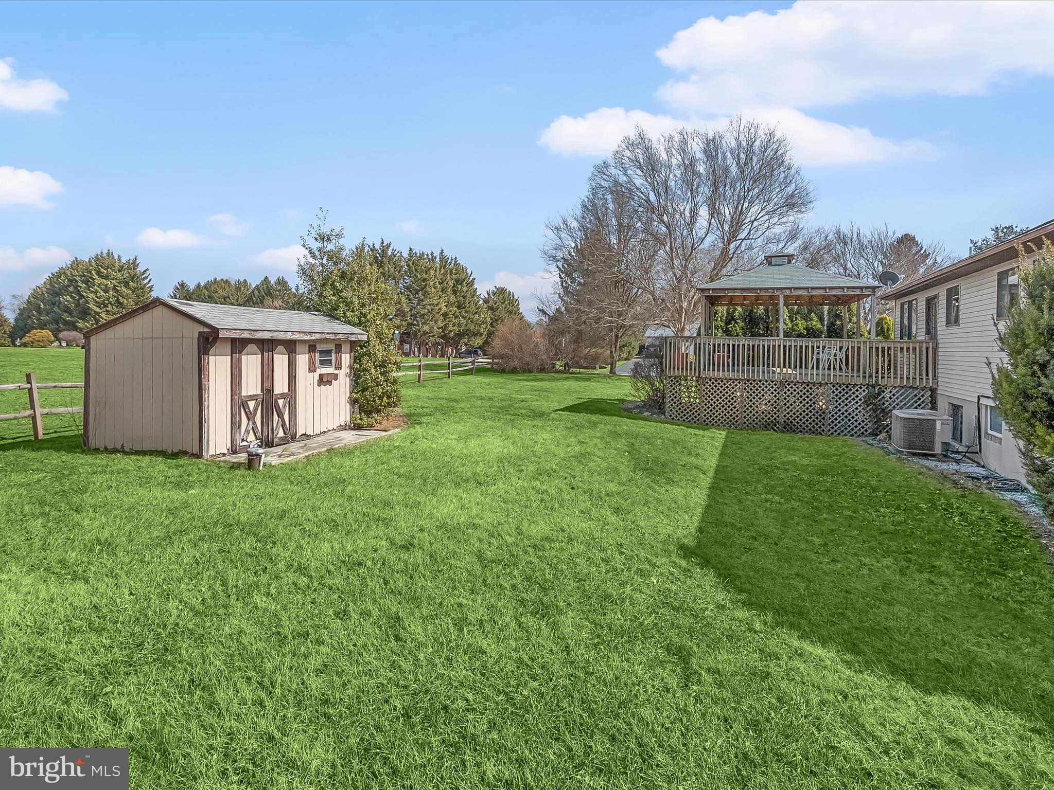 1100 Cedarbrook Road Hampstead, MD 21074 - Photo 38 of 46 a view of a house with a yard and a garden