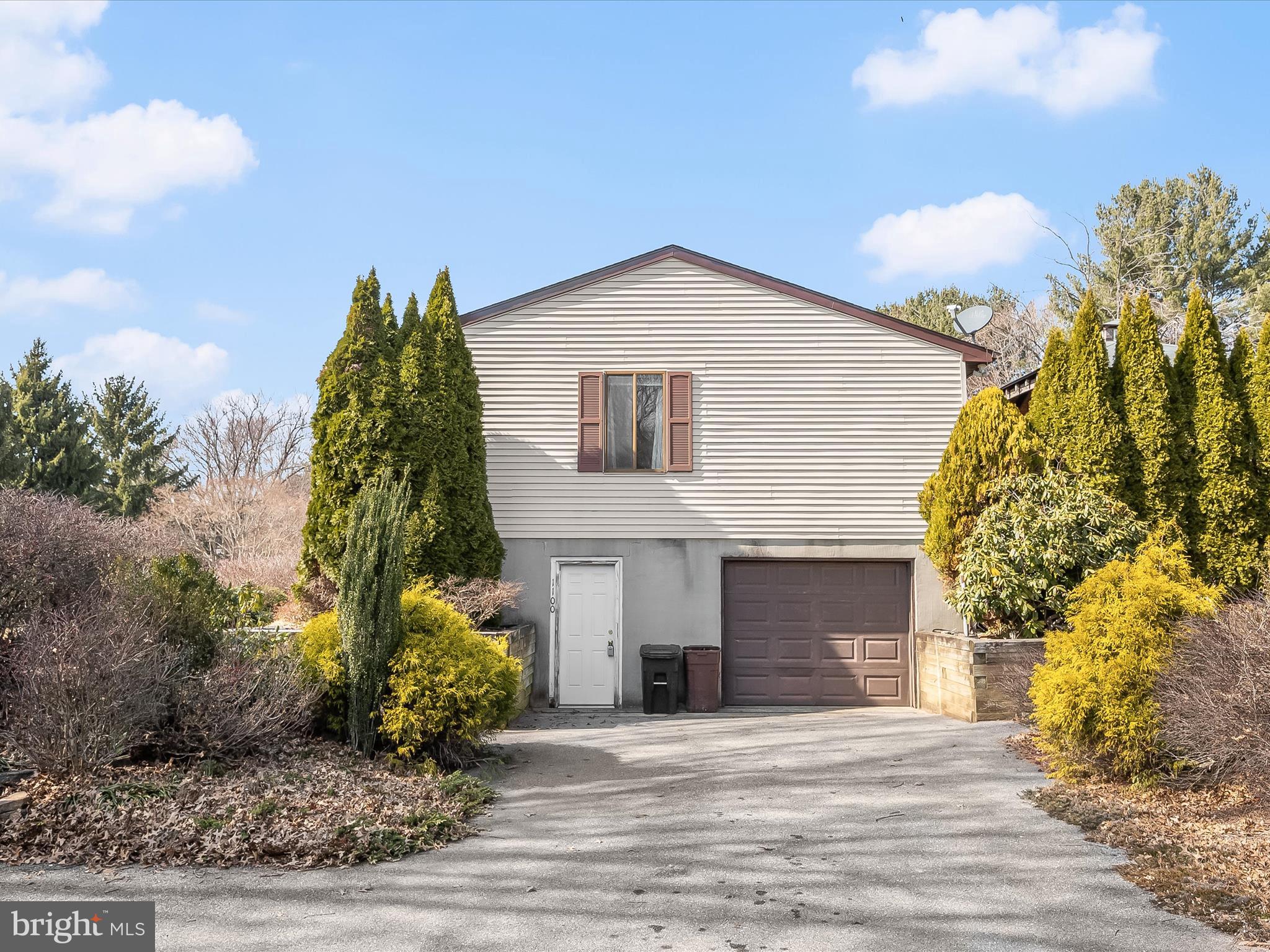 1100 Cedarbrook Road Hampstead, MD 21074 - Photo 41 of 46 a front view of a house with garden