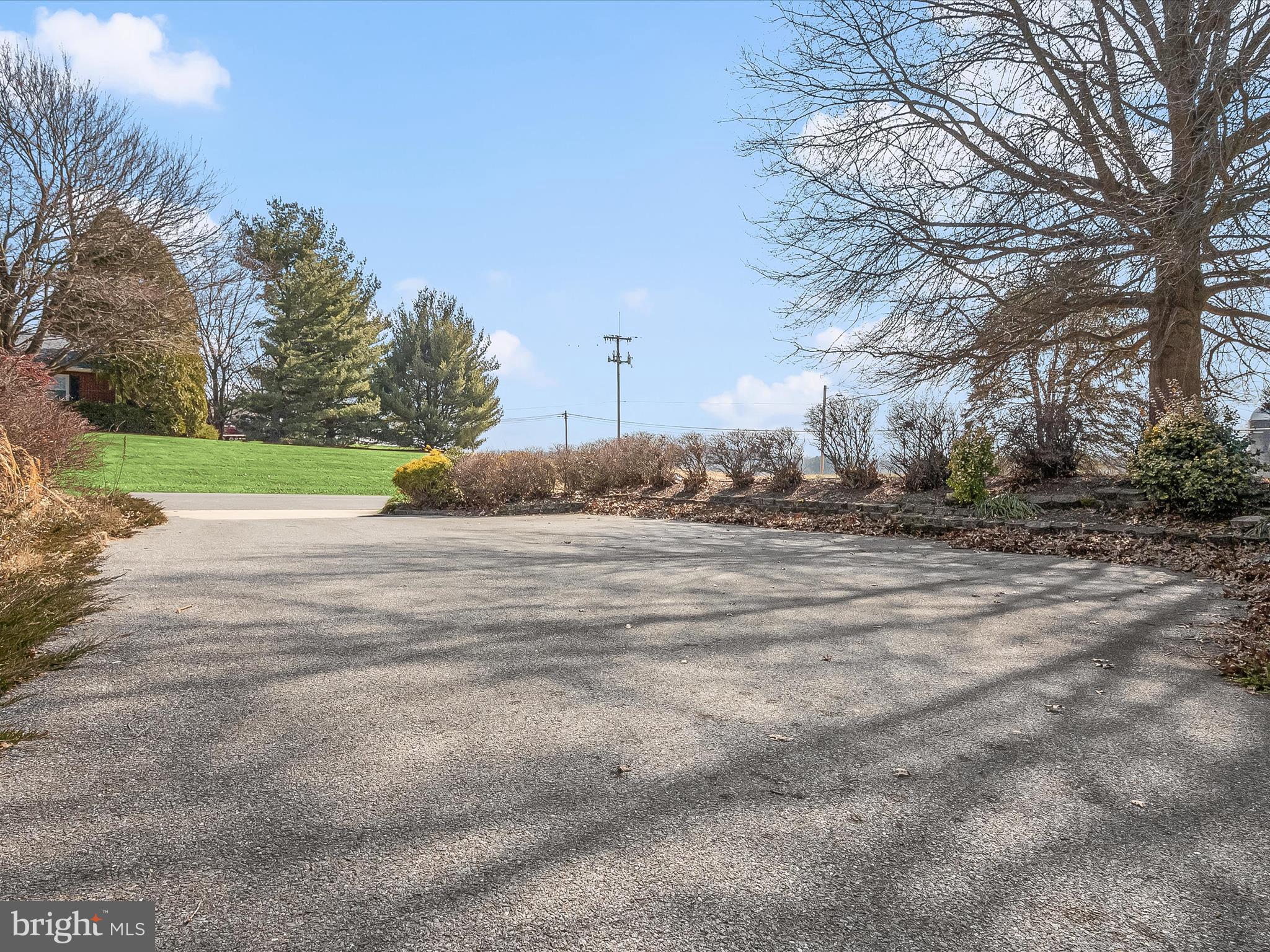 1100 Cedarbrook Road Hampstead, MD 21074 - Photo 42 of 46 a backyard of a house with lots of green space