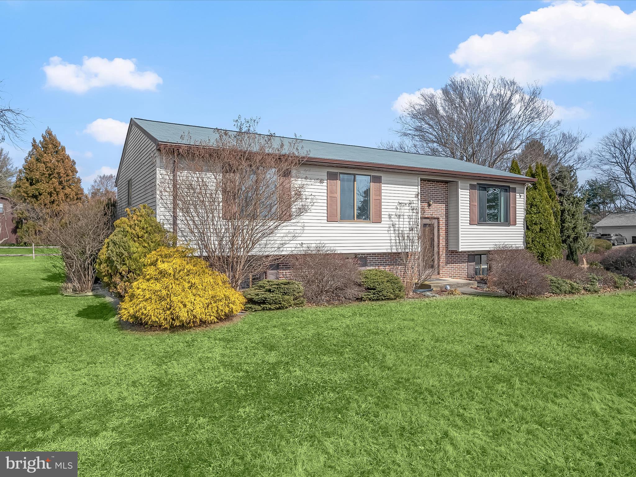 1100 Cedarbrook Road Hampstead, MD 21074 - Photo 43 of 46 a front view of a house with garden