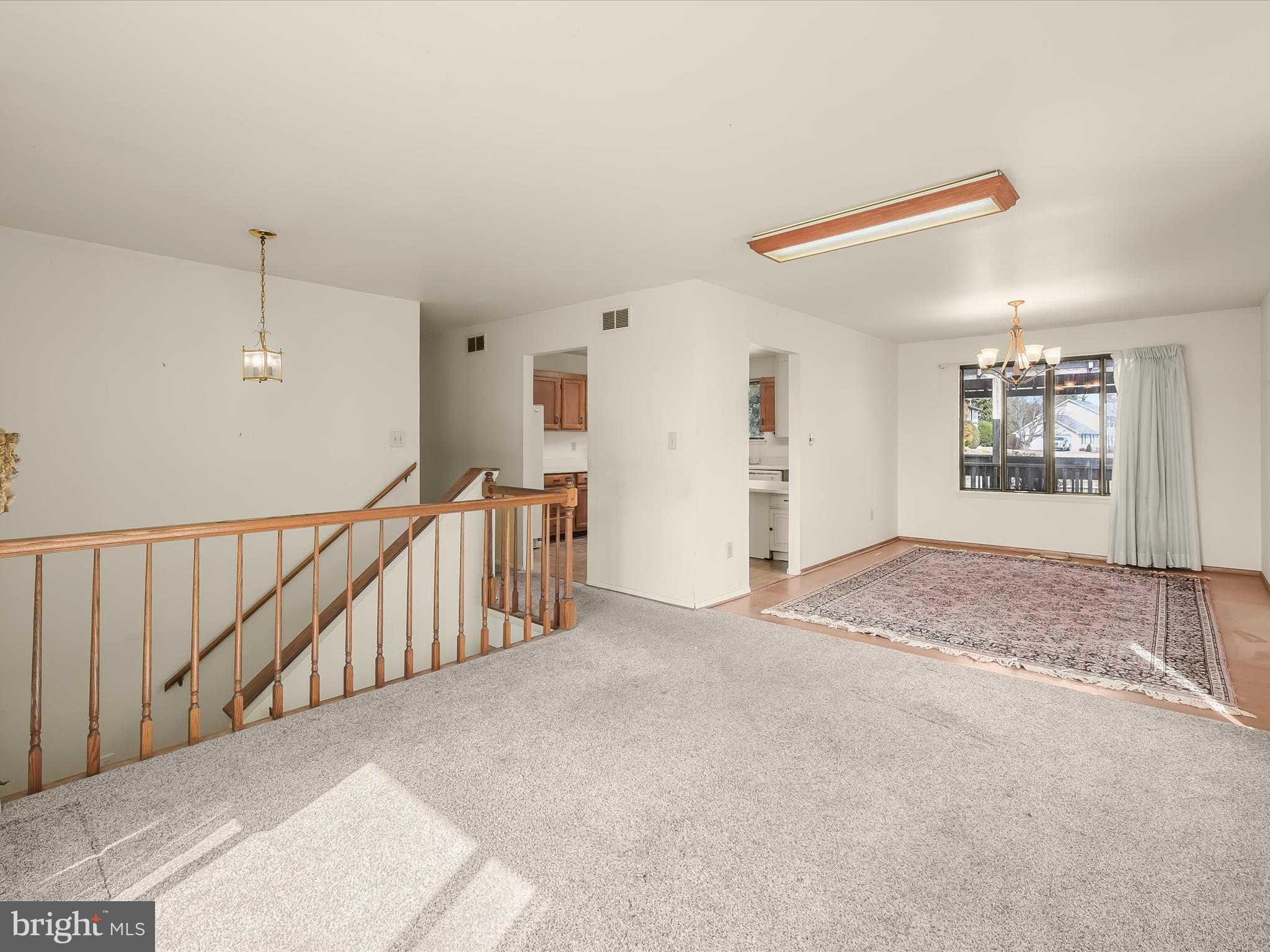 1100 Cedarbrook Road Hampstead, MD 21074 - Photo 7 of 46 a view of livingroom with hardwood floor and hallway
