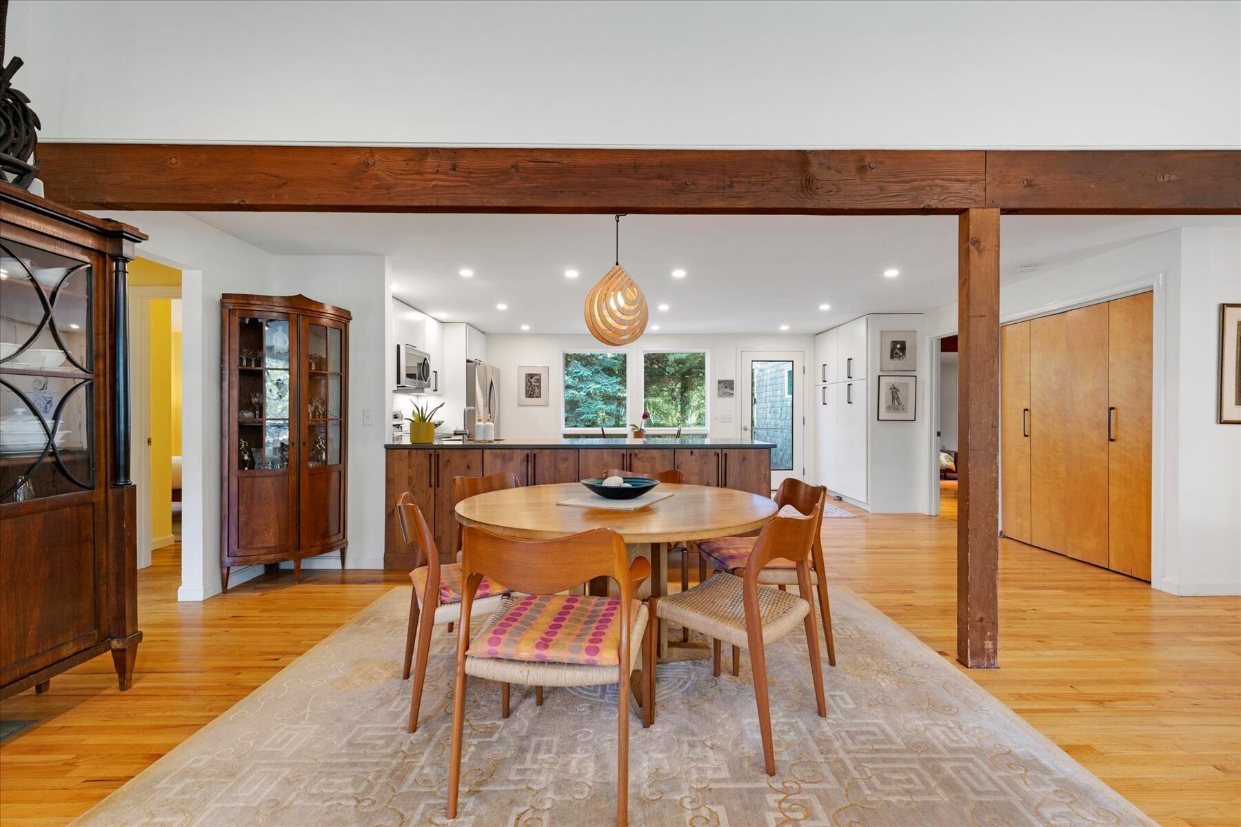225 Coles Neck Road Wellfleet, MA 02667 - Photo 18 of 51 a dining area with a table and chairs