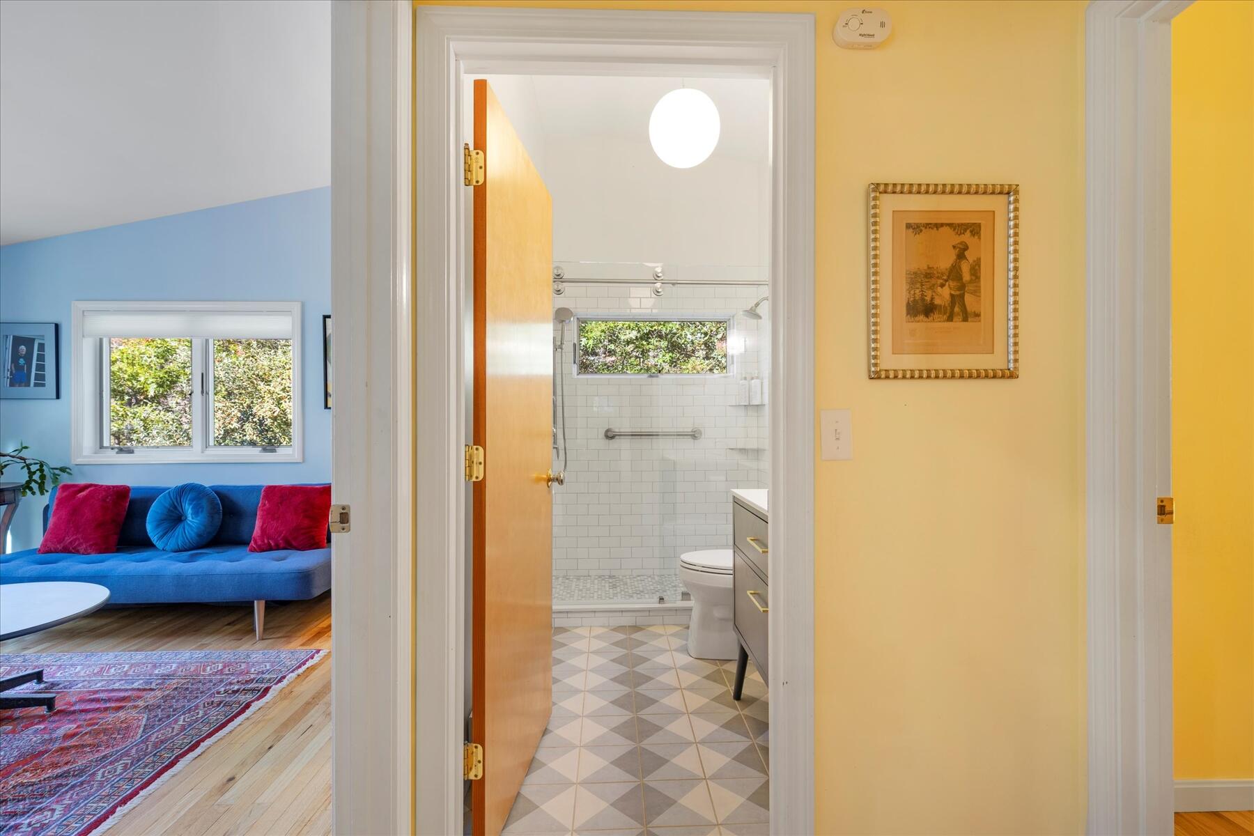 225 Coles Neck Road Wellfleet, MA 02667 - Photo 30 of 51 a view of a bathroom with a sink and a mirror