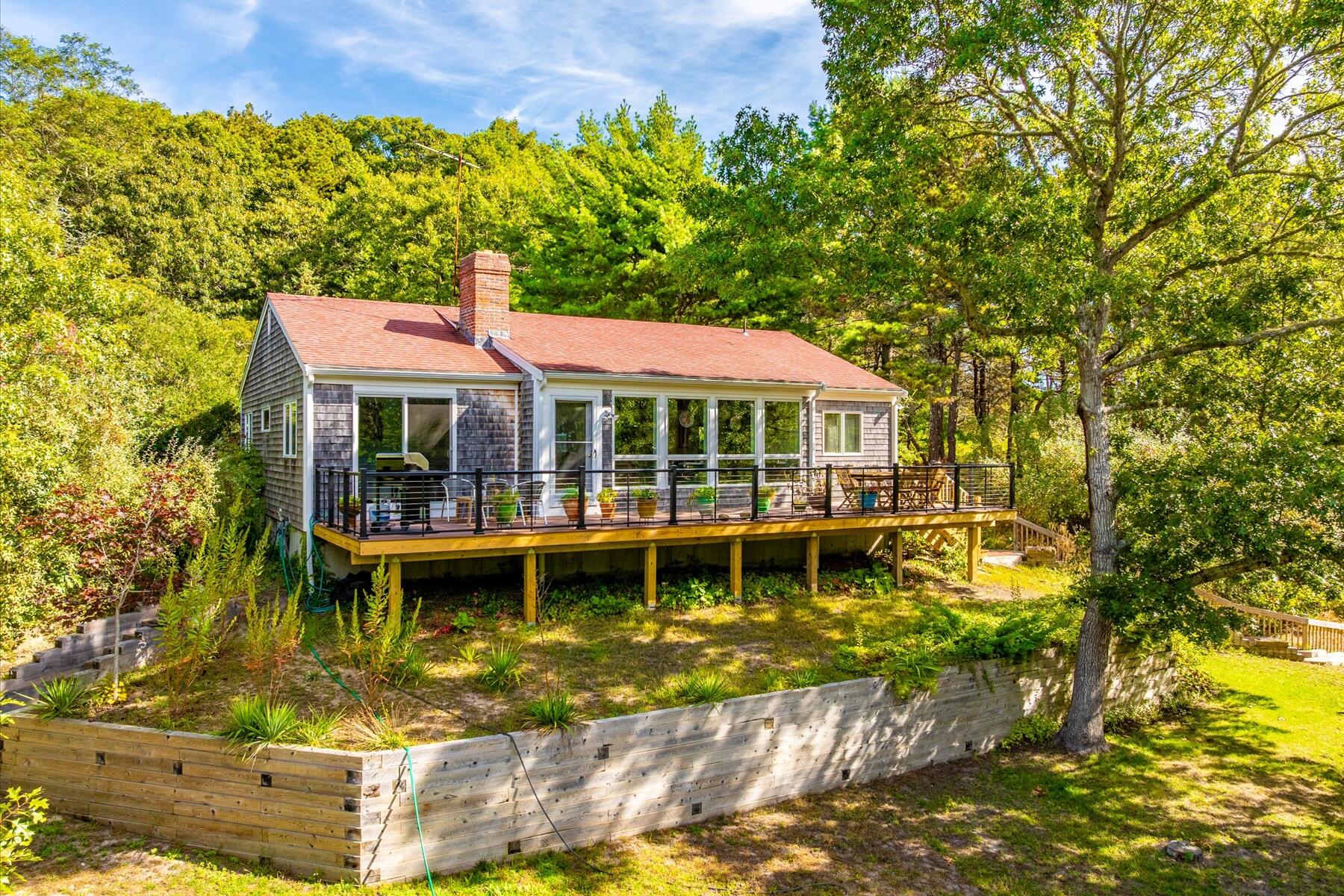 225 Coles Neck Road Wellfleet, MA 02667 - Photo 3 of 51 a house view with a garden space