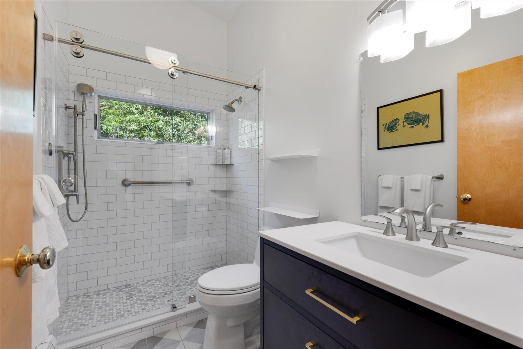 225 Coles Neck Road Wellfleet, MA 02667 - Photo 37 of 51 a bathroom with a sink a toilet and shower