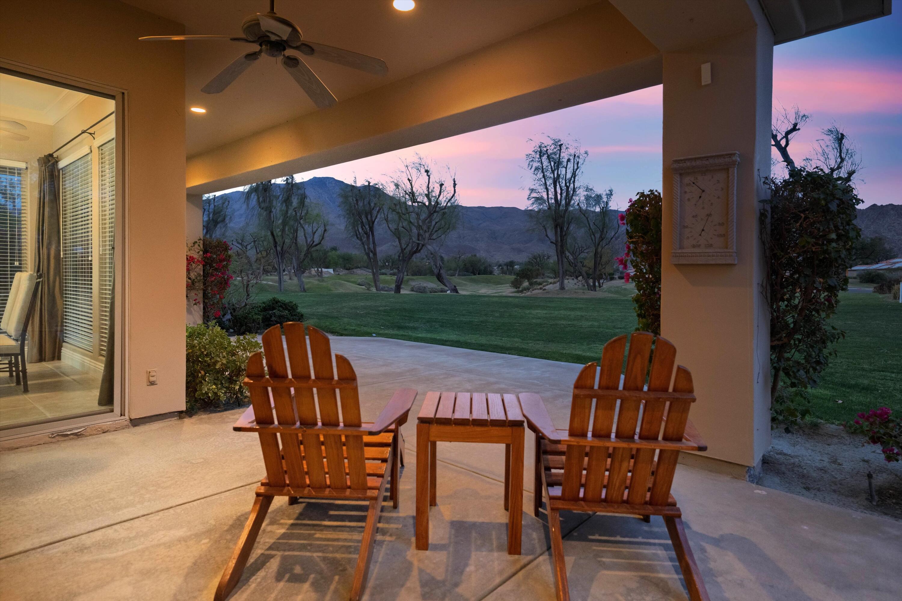 57255 Interlachen La Quinta, CA 92253 - Photo 1 of 34 a view of a porch with furniture and yard
