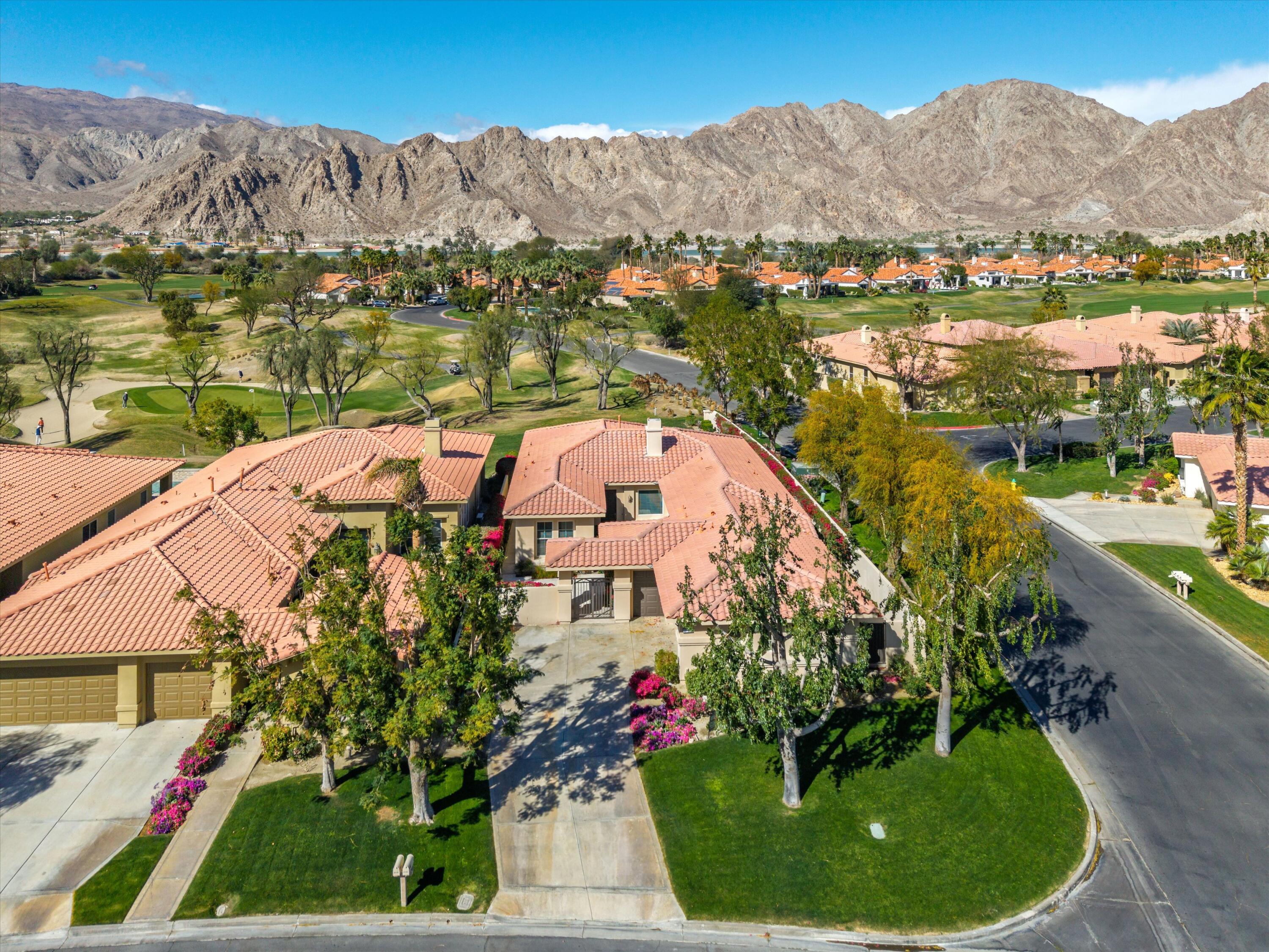 57255 Interlachen La Quinta, CA 92253 - Photo 11 of 34 an aerial view of houses with outdoor space and swimming pool
