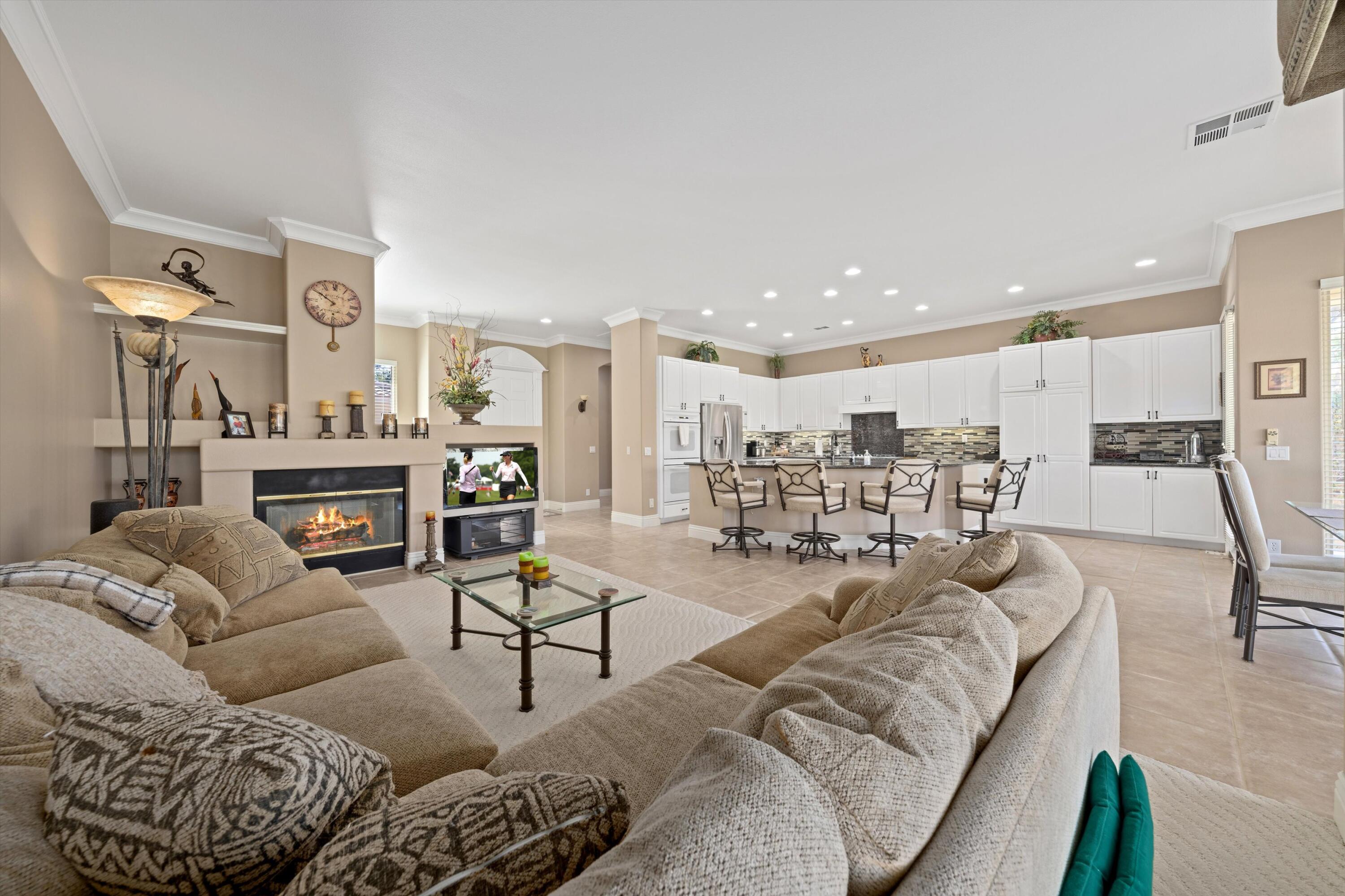 57255 Interlachen La Quinta, CA 92253 - Photo 18 of 34 a living room with furniture and a fireplace