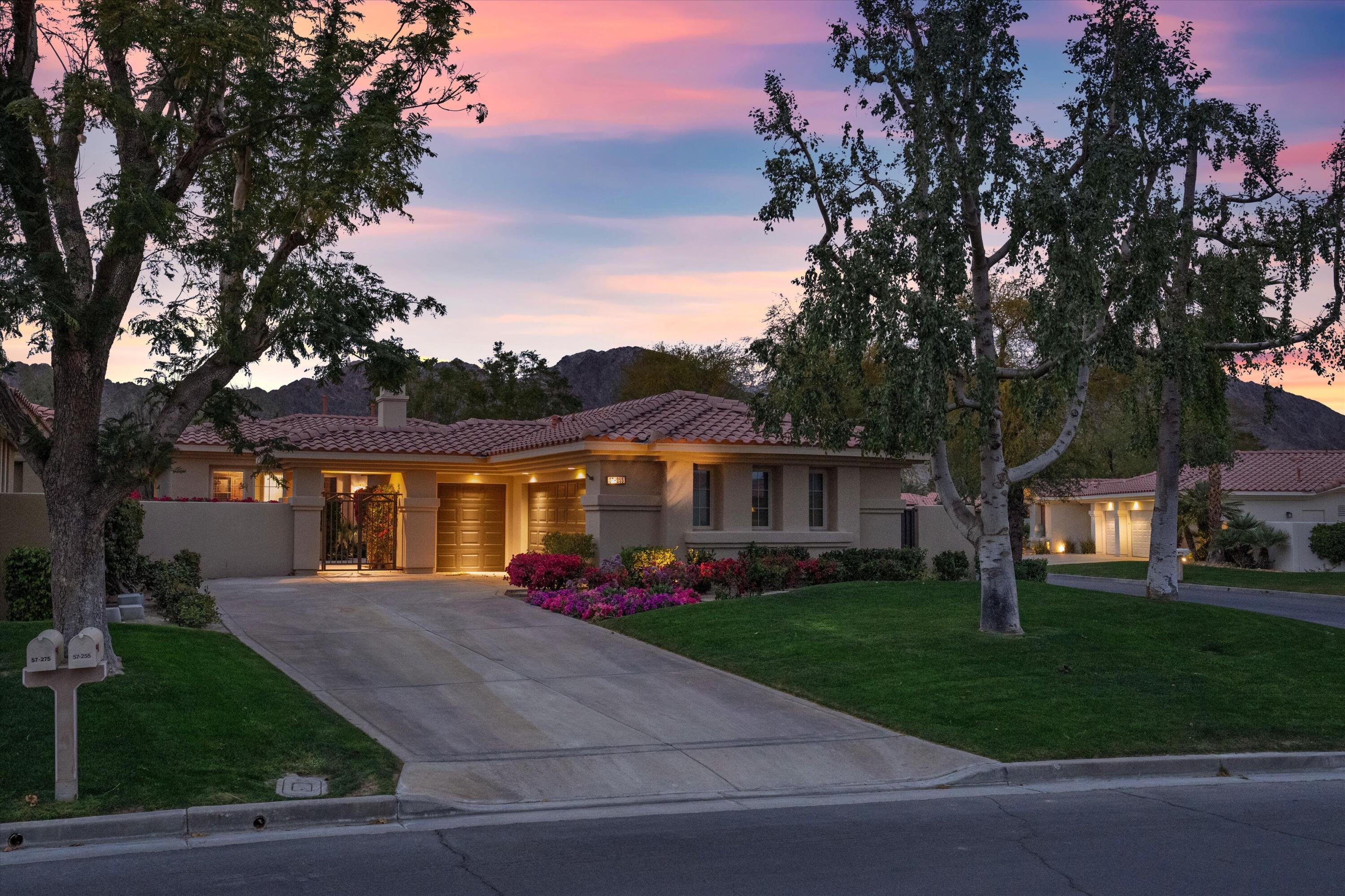 57255 Interlachen La Quinta, CA 92253 - Photo 5 of 34 front view of house with a yard
