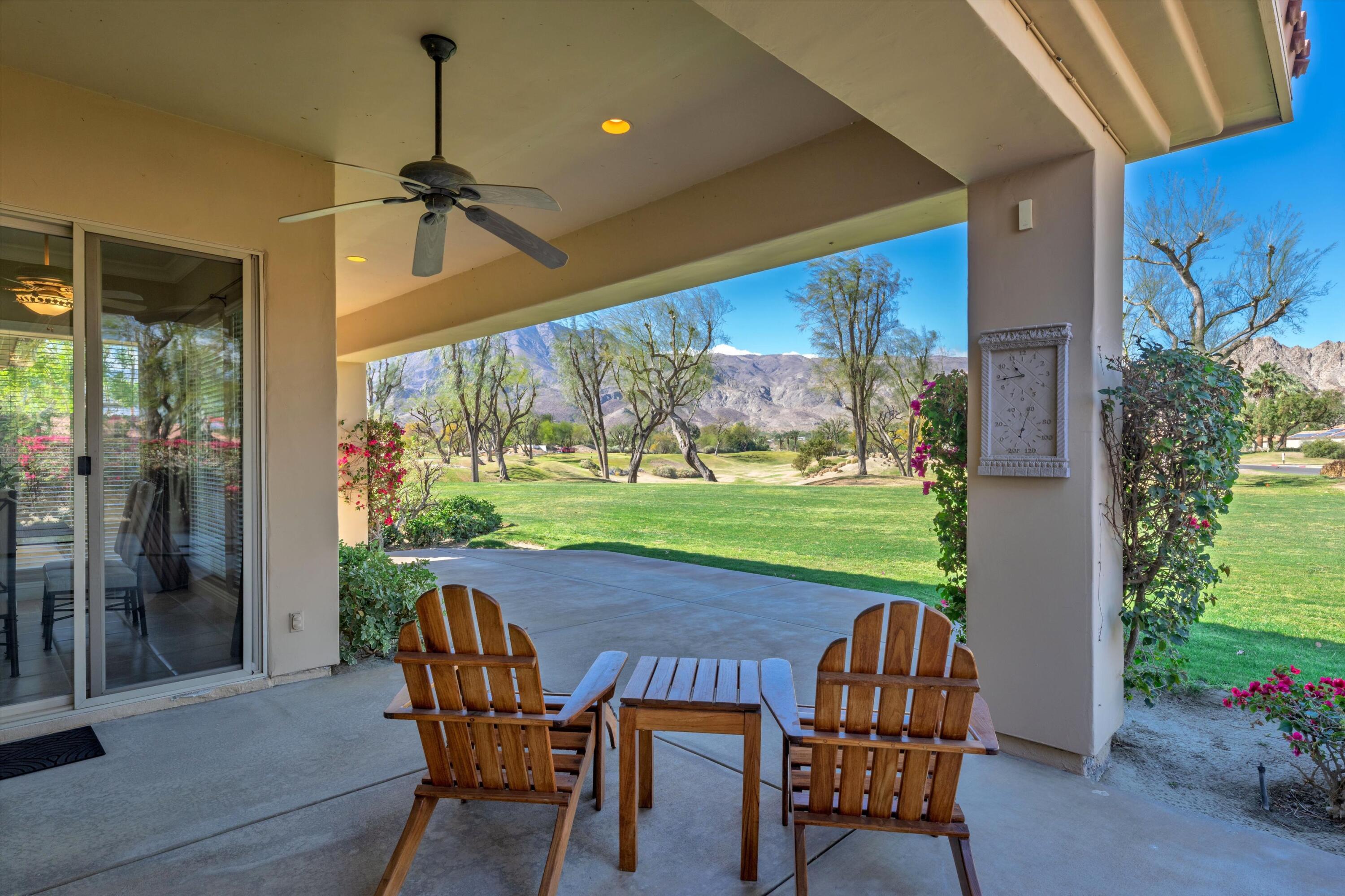 57255 Interlachen La Quinta, CA 92253 - Photo 7 of 34 a view of a porch with furniture and yard