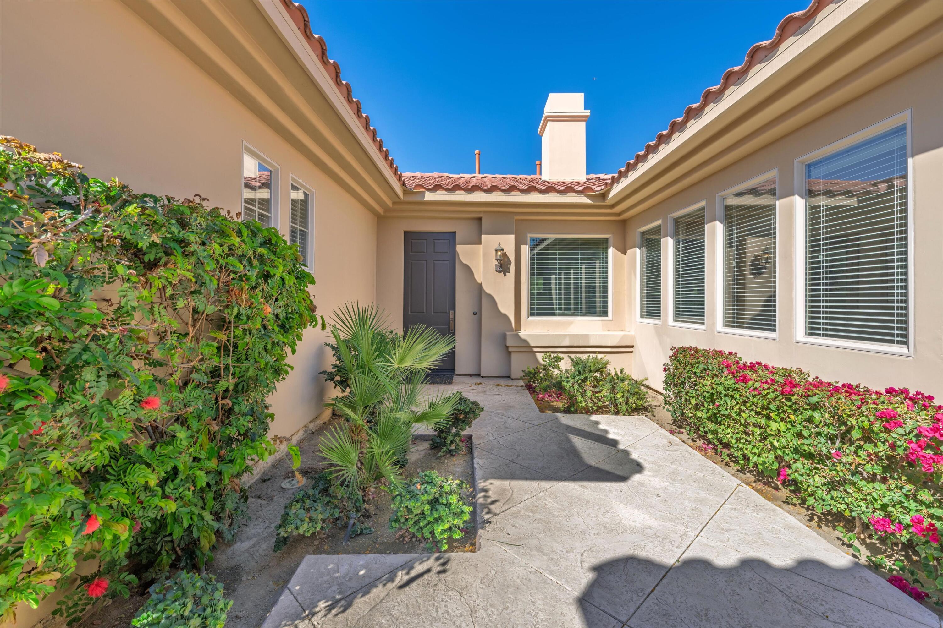 57255 Interlachen La Quinta, CA 92253 - Photo 10 of 34 a view of a house with potted plants
