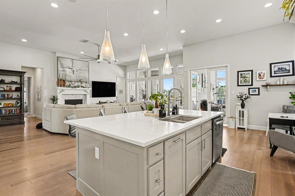 573 Broadleaf Way Haslet, TX 76052 - Photo 17 of 35 a large kitchen with kitchen island a sink appliances and cabinets