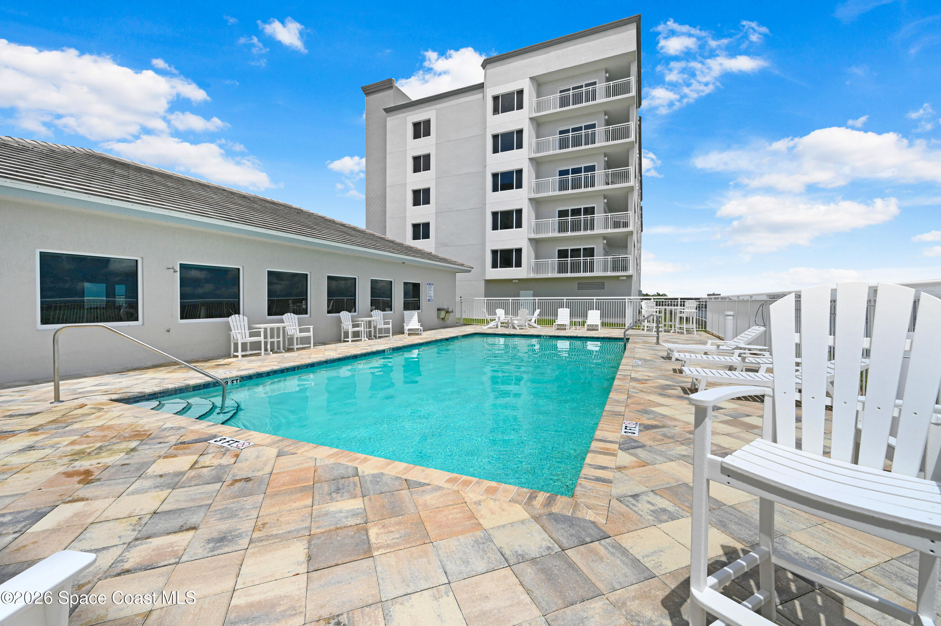 1805 Riverside Drive, Unit 304 Titusville, FL 32780 - Photo 9 of 46 a view of a patio with a ocean view