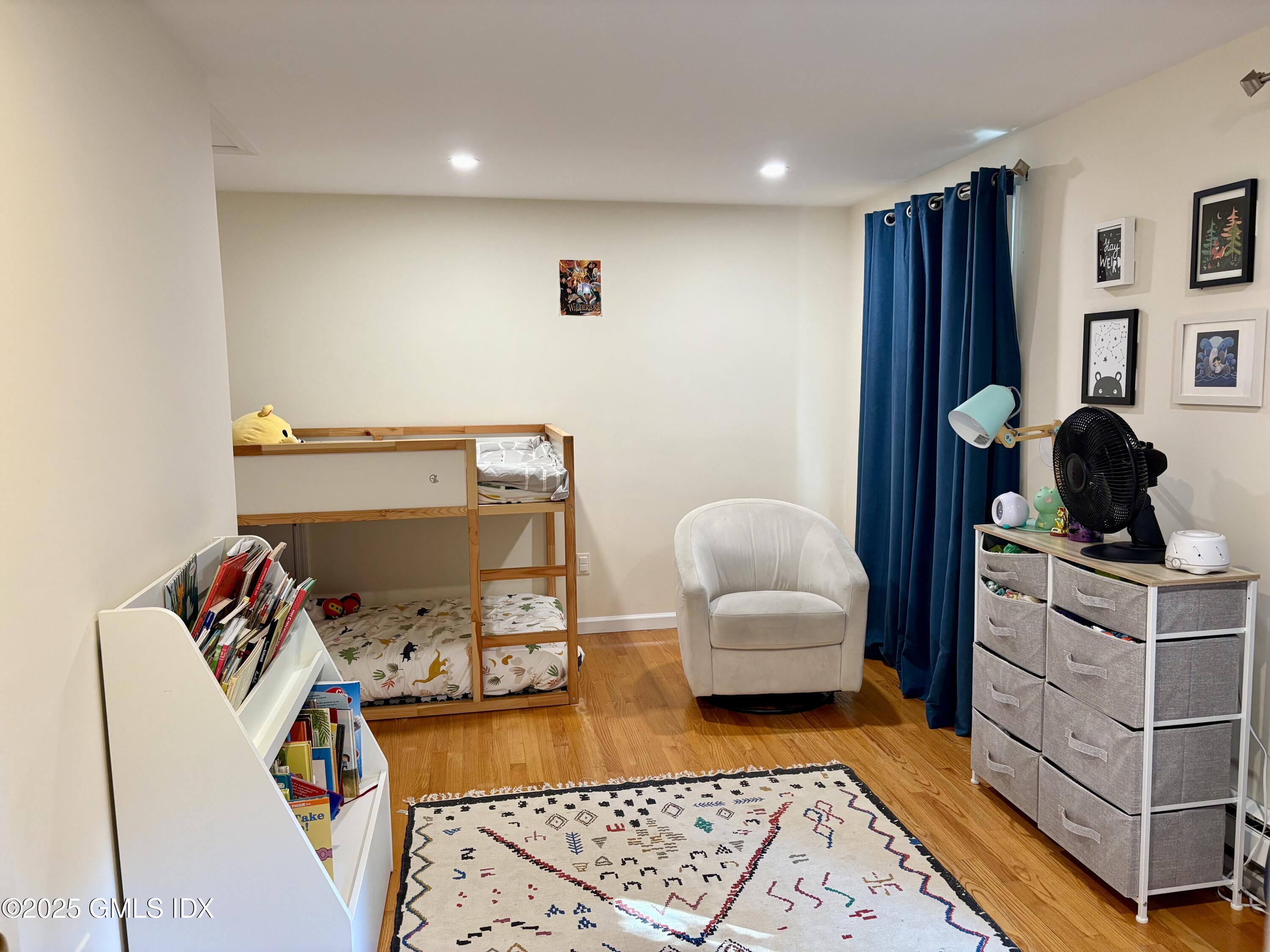 19 Wescott Street Riverside, CT 06878 - Photo 12 of 21 a bedroom with furniture and a window