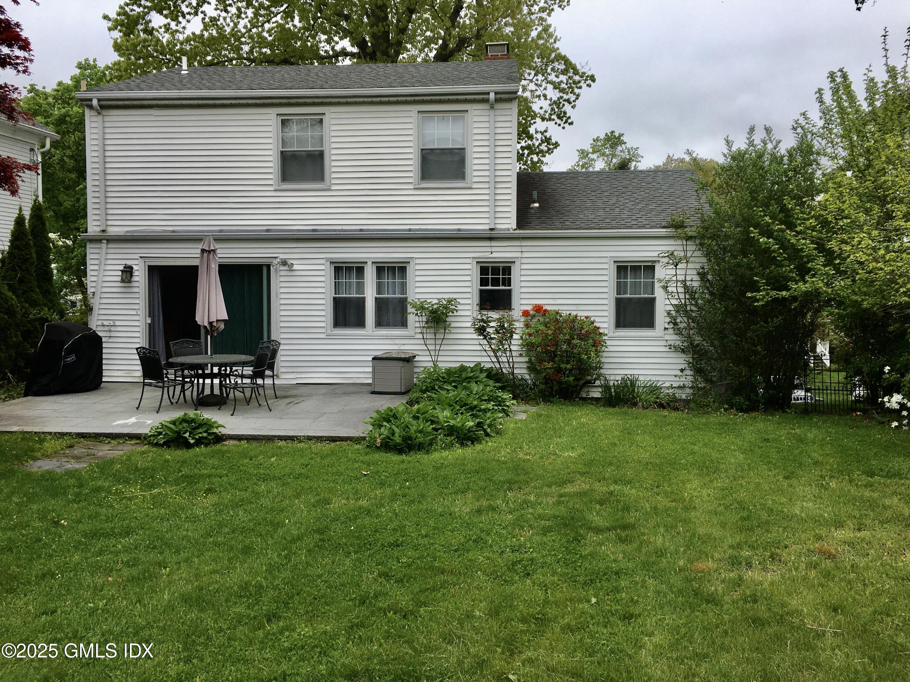 19 Wescott Street Riverside, CT 06878 - Photo 21 of 21 a view of a house with a backyard