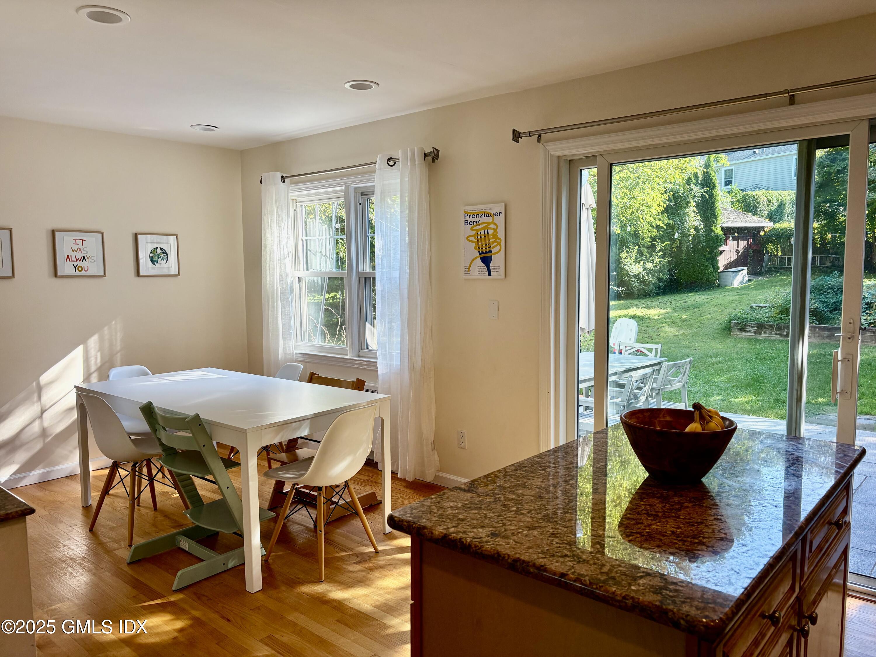 19 Wescott Street Riverside, CT 06878 - Photo 7 of 21 a view of a dining room with furniture and wooden floor