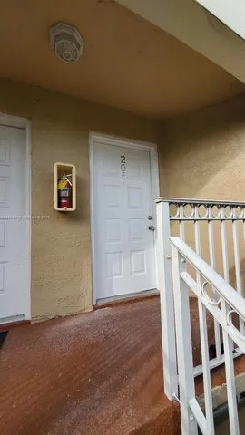 a view of a park with a slide