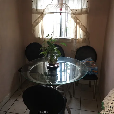 a room with furniture and flat screen tv