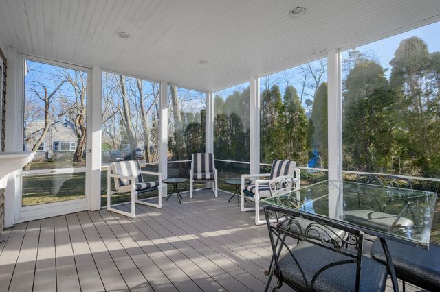 a dining room with furniture and outdoor view