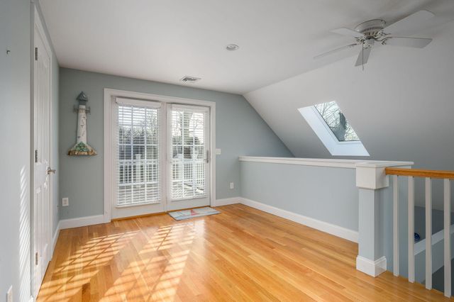 a view of a wooden roof deck