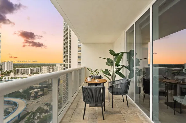 a view of balcony with furniture
