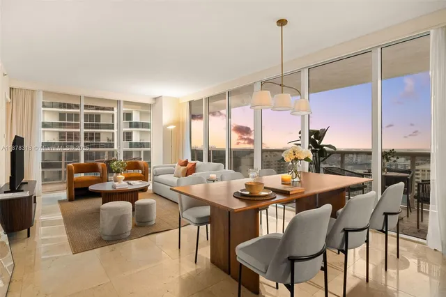 a view of a livingroom with furniture and window