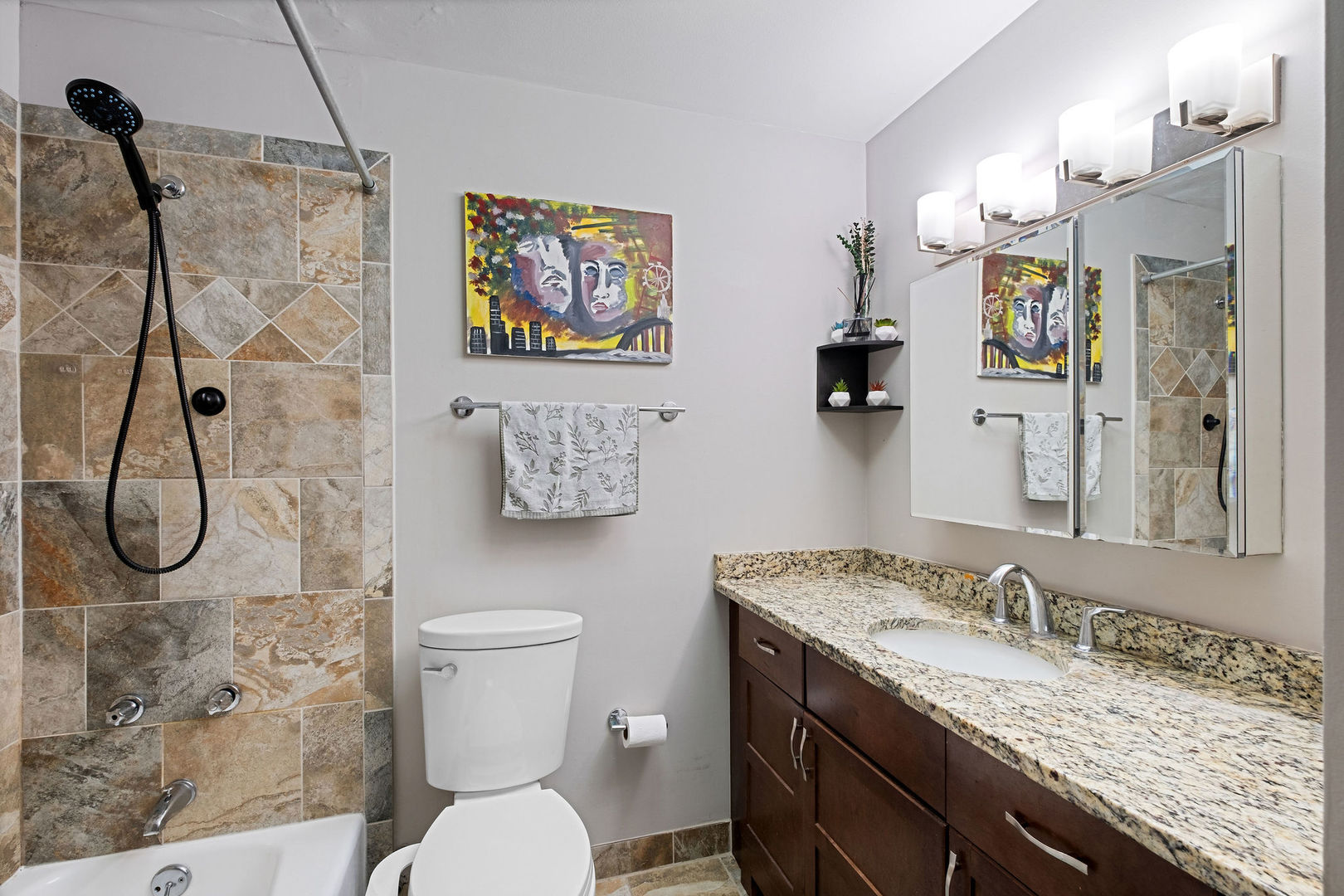 5445 North Sheridan Road, Unit 802 Chicago, IL 60640 - Photo 22 of 32 a bathroom with a granite countertop sink a toilet and a shower