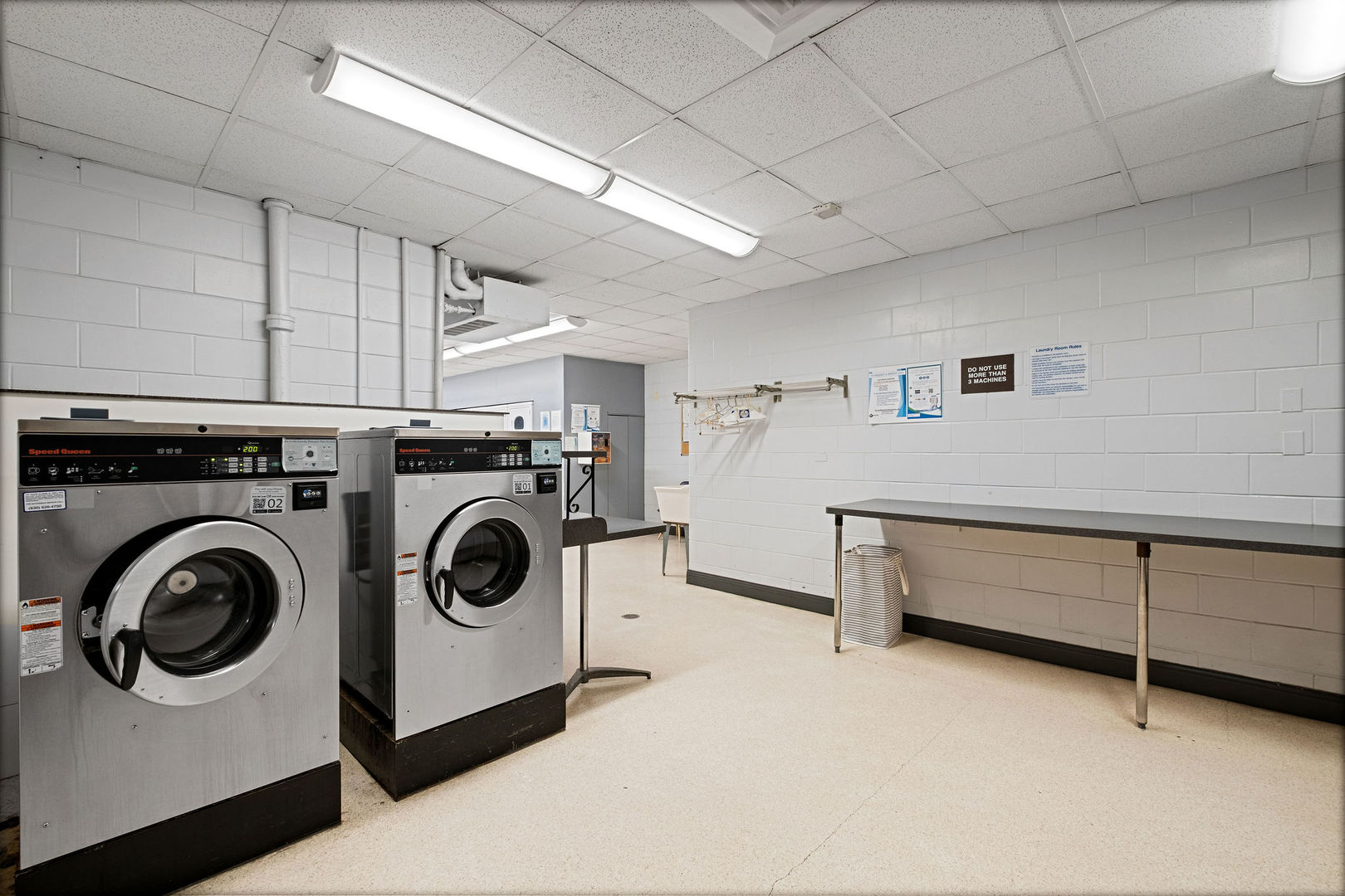 5445 North Sheridan Road, Unit 802 Chicago, IL 60640 - Photo 25 of 32 a utility room with dryer and washer