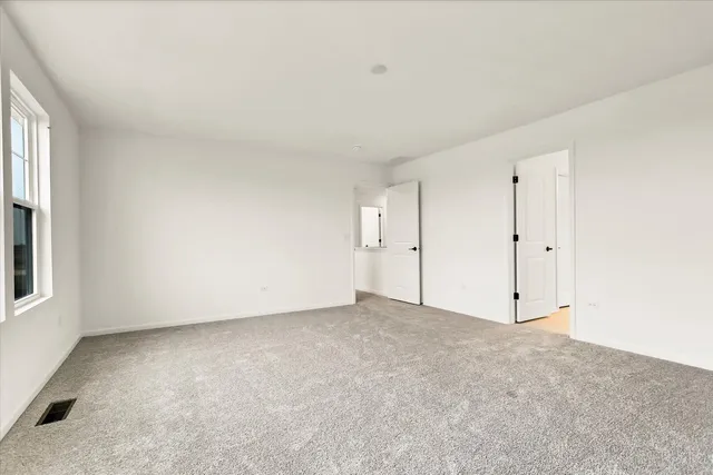 an empty room with a natural light