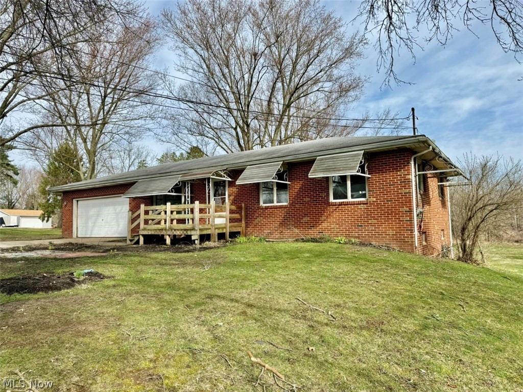 1445 Killian Road Akron, OH 44312 - Photo 14 of 21 Single story home with a garage and a front yard