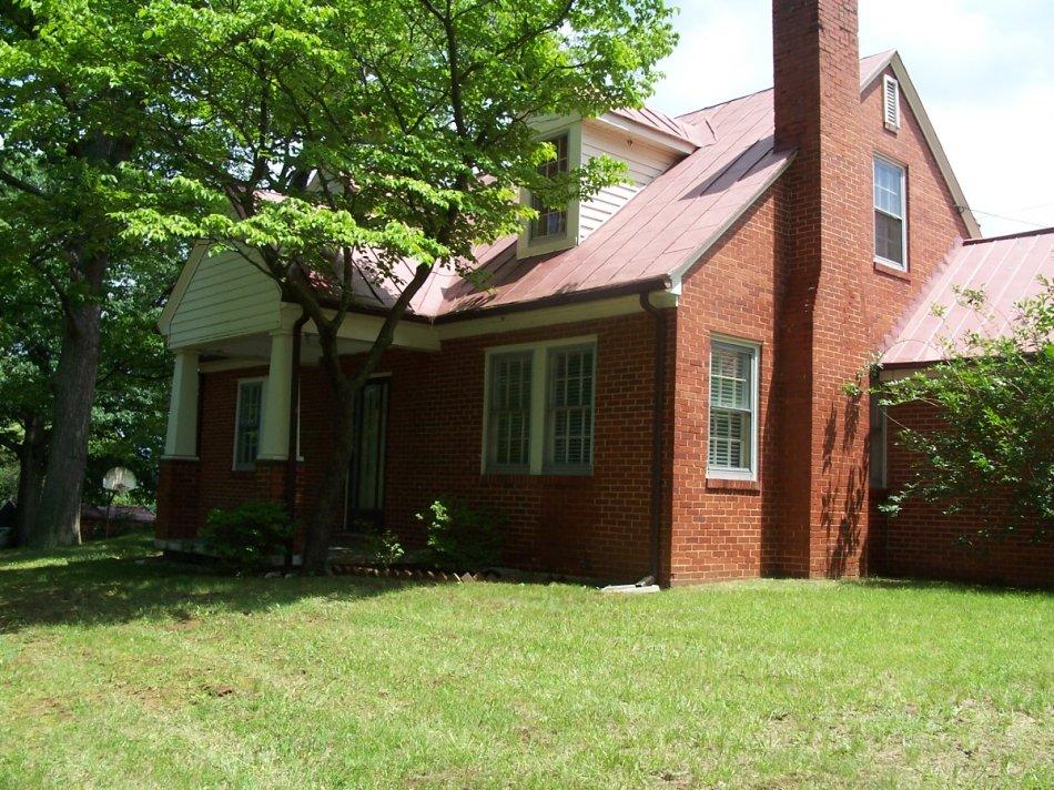 1065 Gross Hollow Road Blue Ridge, VA 24064 - Photo 1 of 8 front view of a house with a yard
