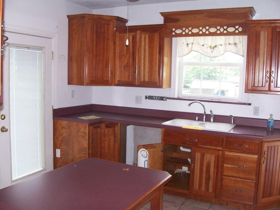 1065 Gross Hollow Road Blue Ridge, VA 24064 - Photo 4 of 8 a kitchen with a sink cabinets and window