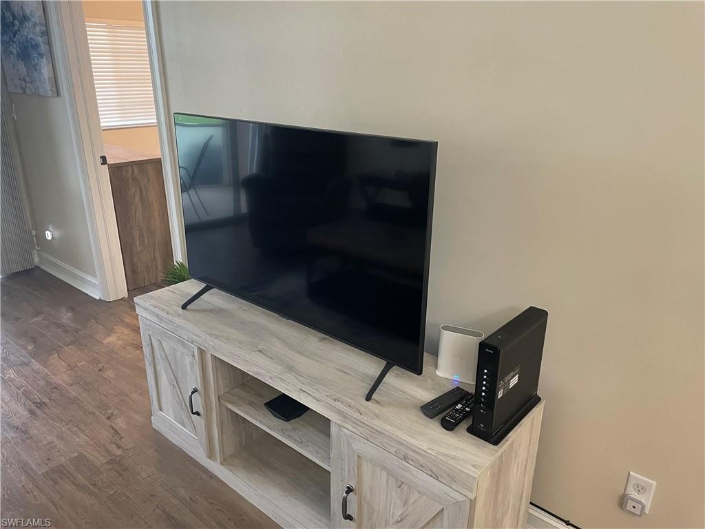 9195 Michael Circle, Unit 1301 Naples, FL 34113 - Photo 7 of 25 a utility room with dryer and washer