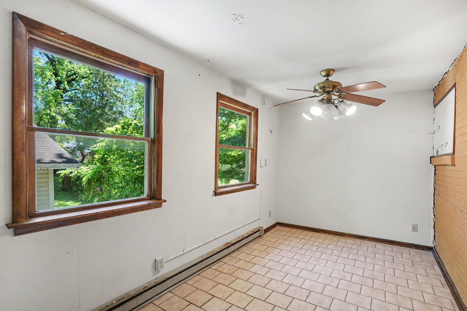 1661 Burr Oak Road Homewood, IL 60430 - Photo 10 of 17 a view of an empty room with a window