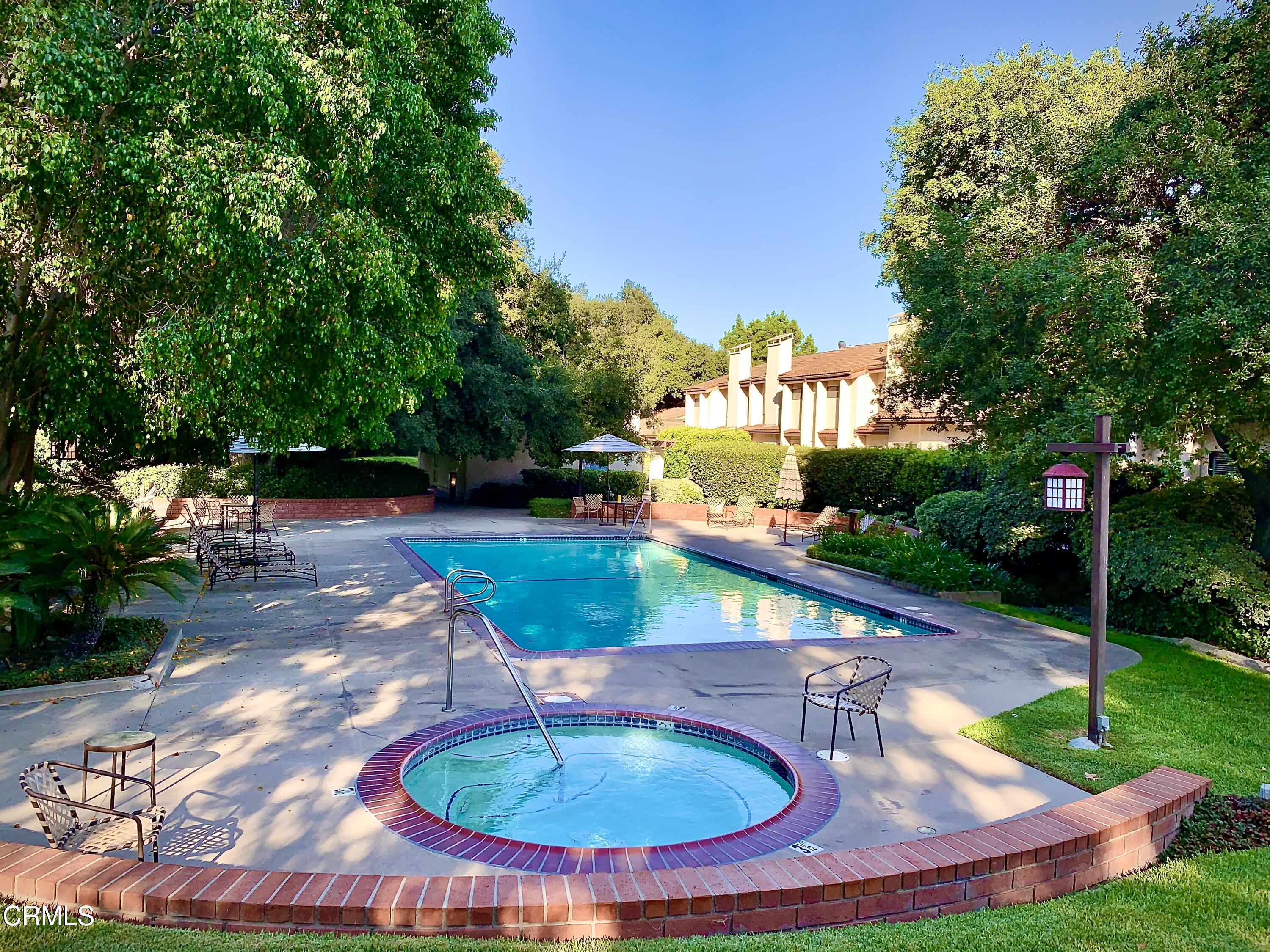 3232 La Vina Way Pasadena, CA 91107 - Photo 24 of 27 a swimming pool with an outdoor seating