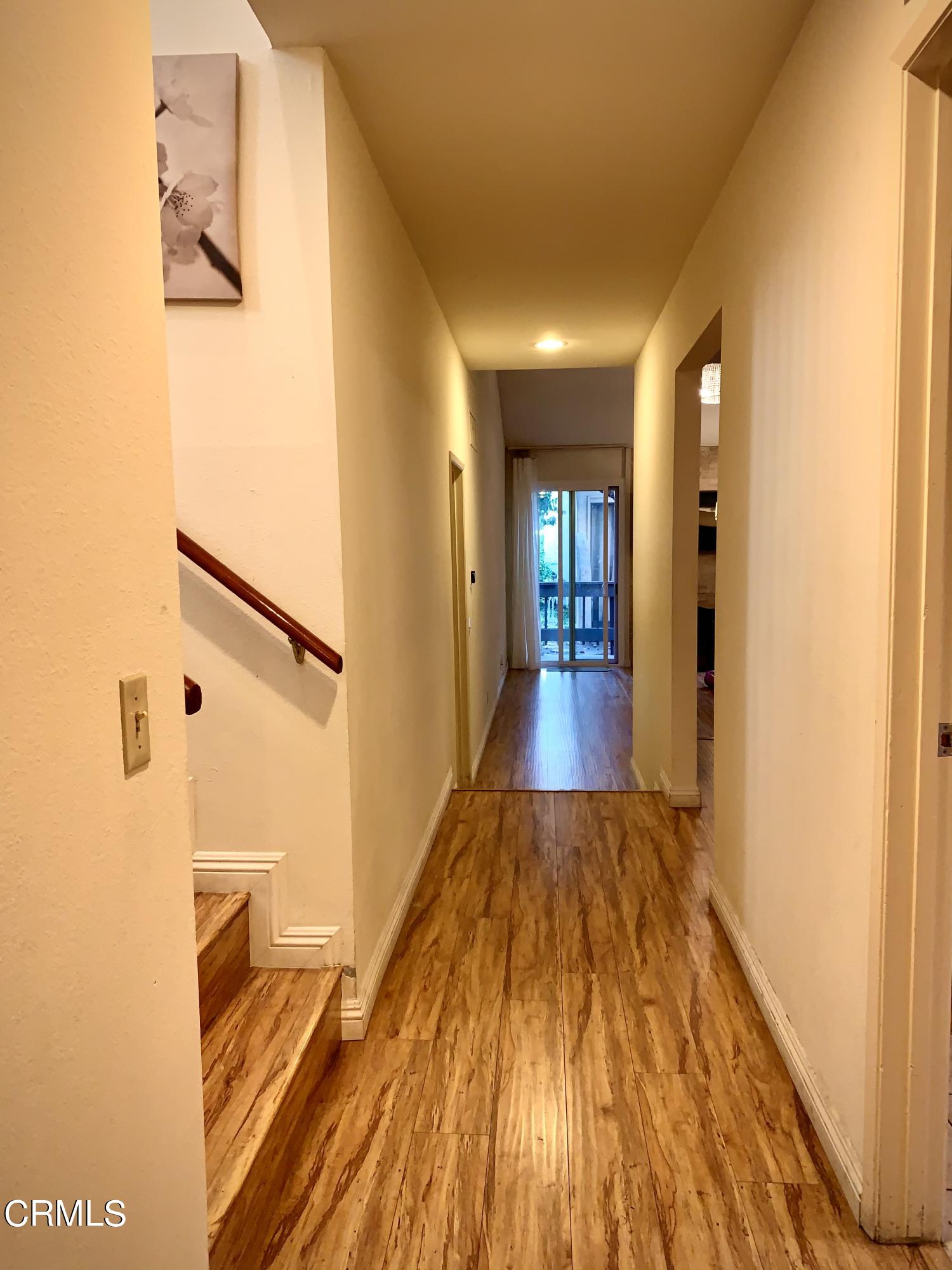 3232 La Vina Way Pasadena, CA 91107 - Photo 8 of 27 a view of a hallway with wooden floor