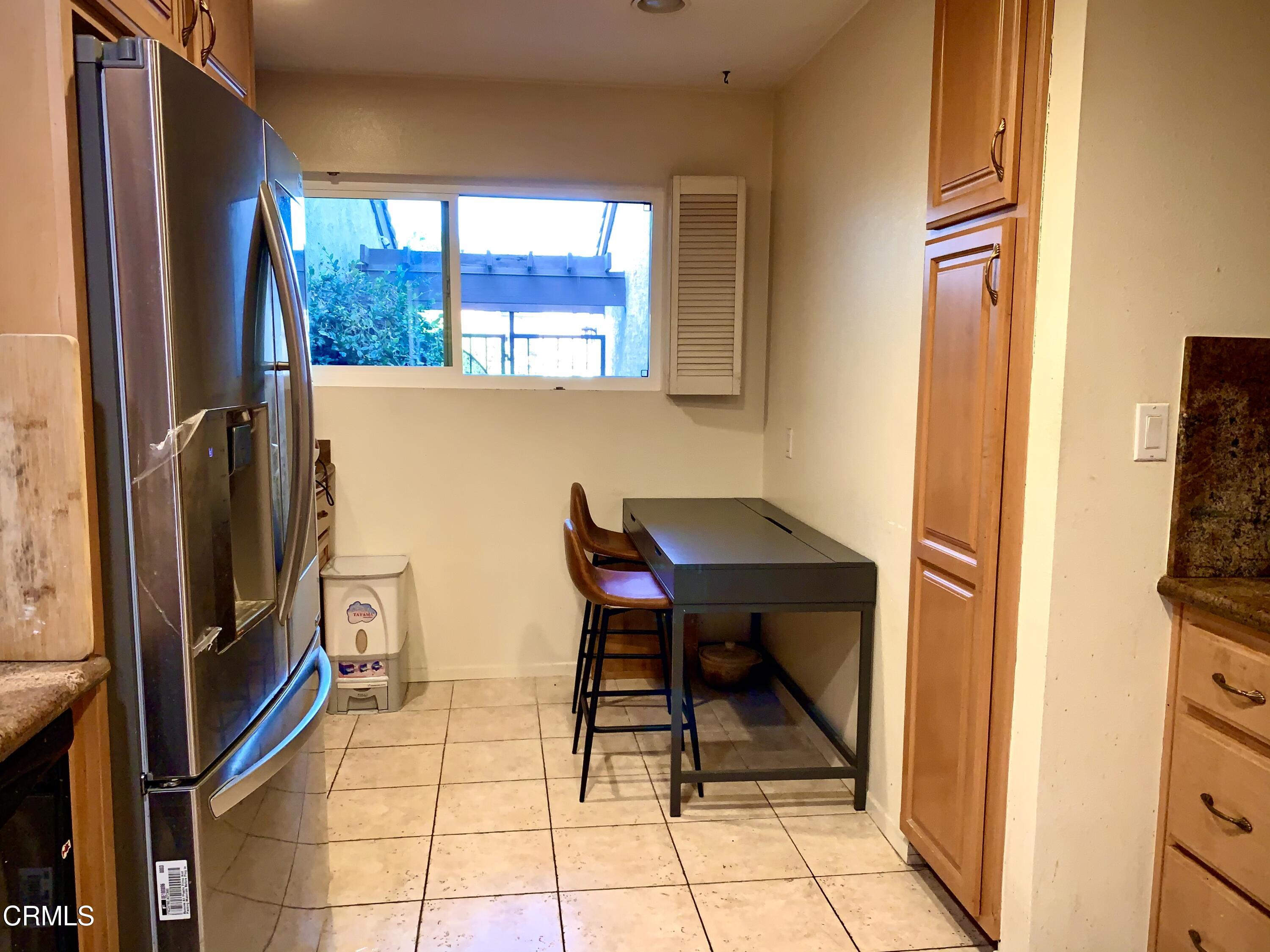 3232 La Vina Way Pasadena, CA 91107 - Photo 10 of 27 a dining room with furniture and a window