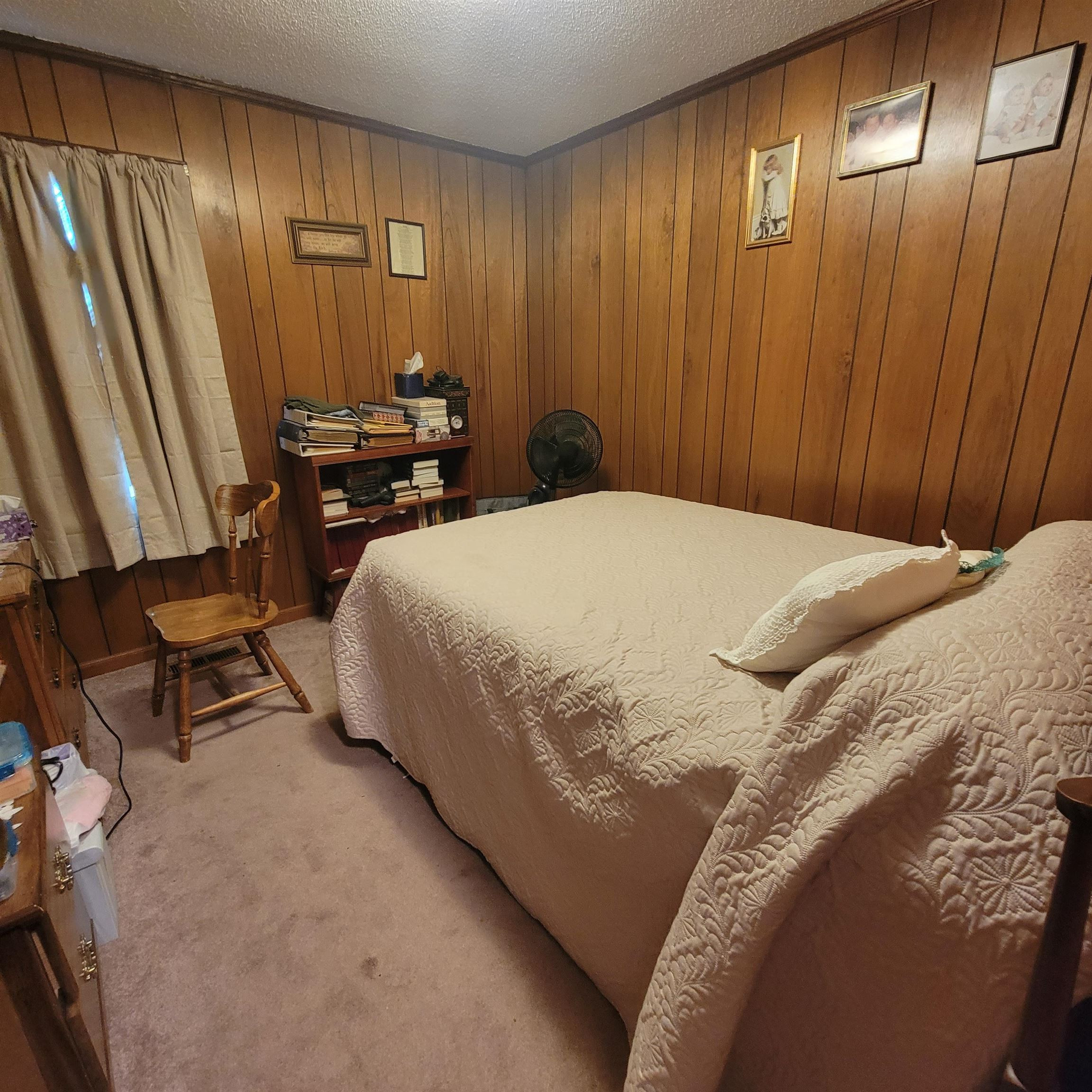725 Diamond Grove Road Pinson, TN 38366 - Photo 4 of 10 a bedroom with a bed and a mirror