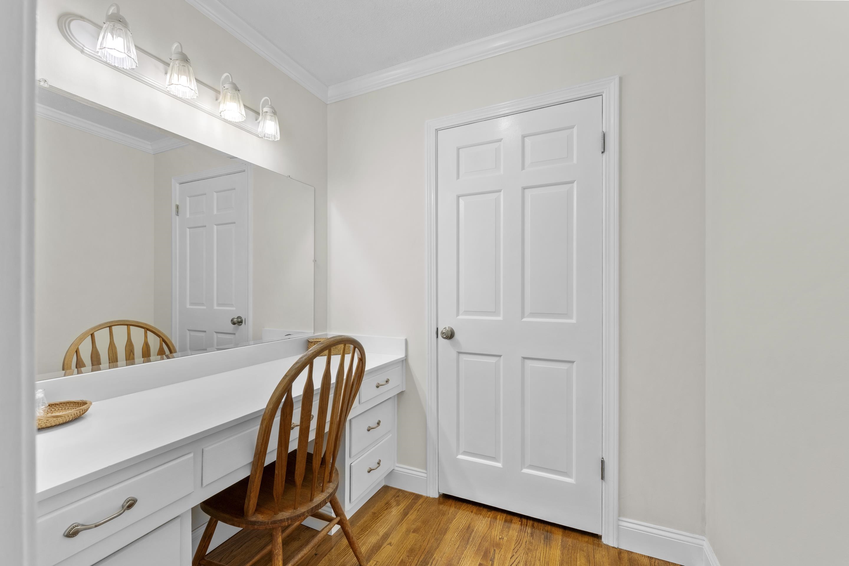 2218 Riverdale Road Germantown, TN 38138 - Photo 19 of 40 Separate vanity and dressing area provides additional storage and convenience, making busy mornings a breeze.
