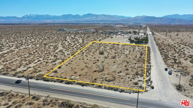 a view of a mountain from the balcony