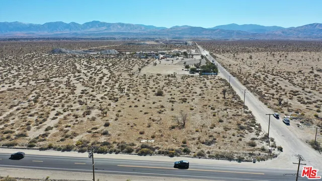 a view of a house and a yard