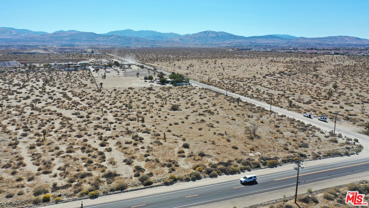 75-th 75-th Street Pearblossom, CA 93553 - Photo 7 of 17 a view of a large mountain with a outdoor space