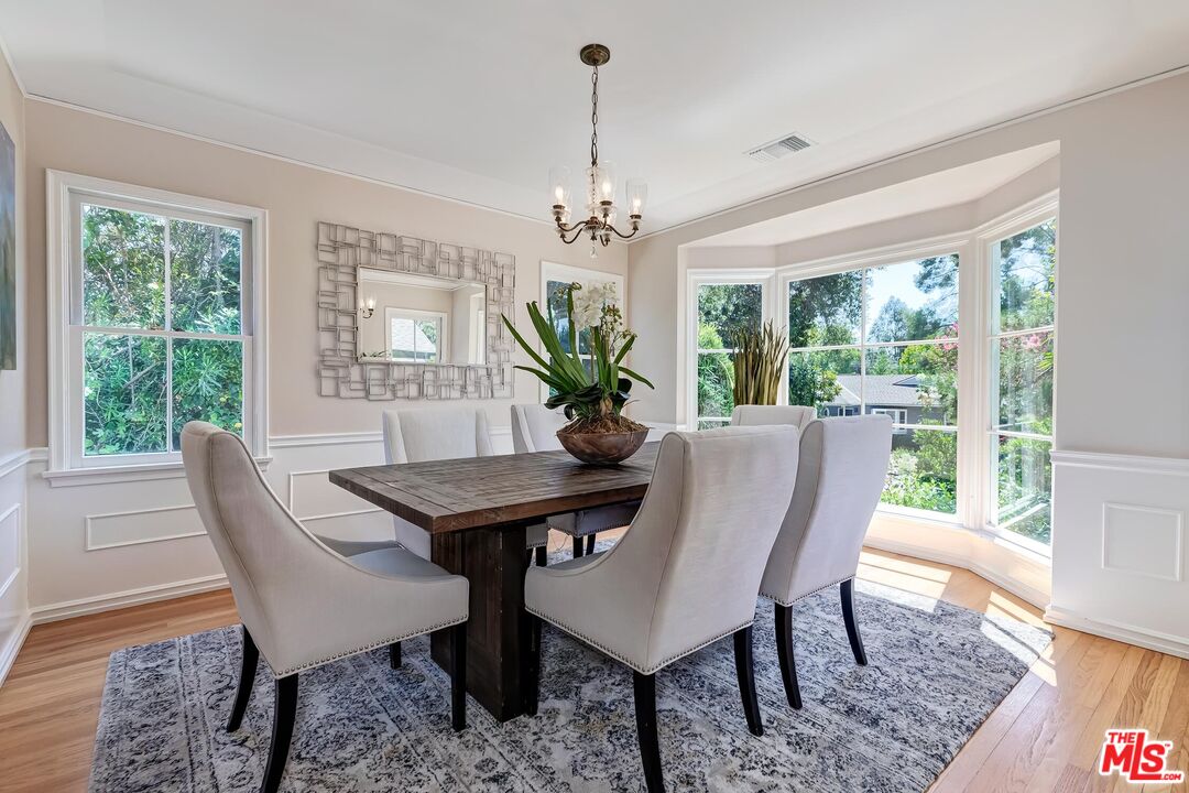 929 Mesa Verde Road Pasadena, CA 91105 - Photo 11 of 51 a view of a dining room with furniture window and outside view