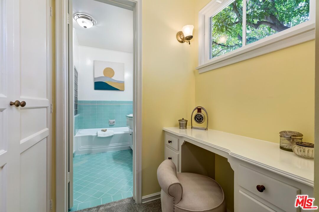 929 Mesa Verde Road Pasadena, CA 91105 - Photo 22 of 51 a bathroom with a sink a toilet and shower