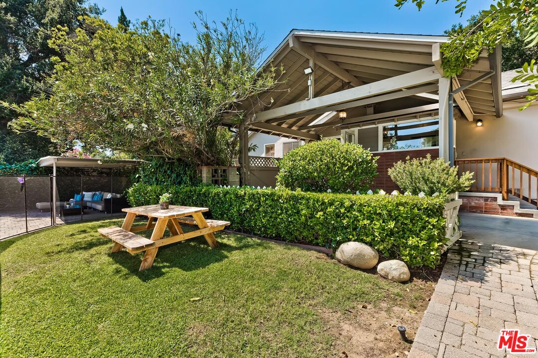 929 Mesa Verde Road Pasadena, CA 91105 - Photo 35 of 51 a backyard of a house with yard fire pit and outdoor seating
