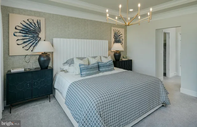 a bedroom with a bed and a night stand