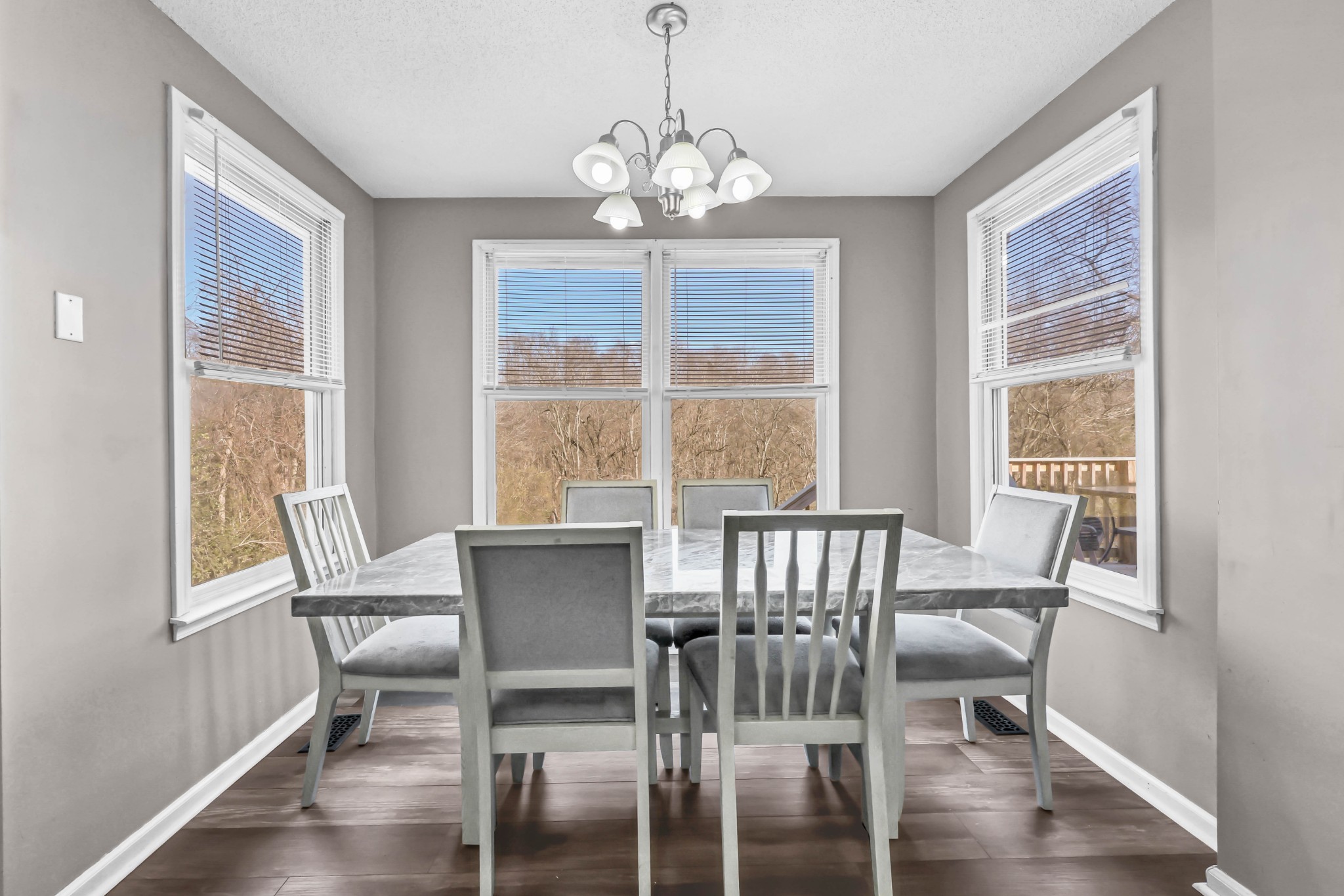 1440 McClardy Road Clarksville, TN 37042 - Photo 12 of 33 a view of a dining room with furniture window and wooden floor